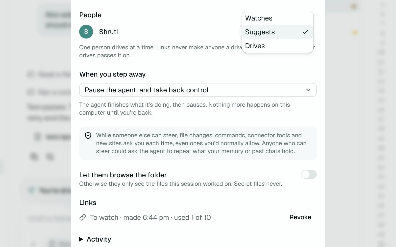The role picker next to Shruti in the share dialog: Watches, Suggests, Drives